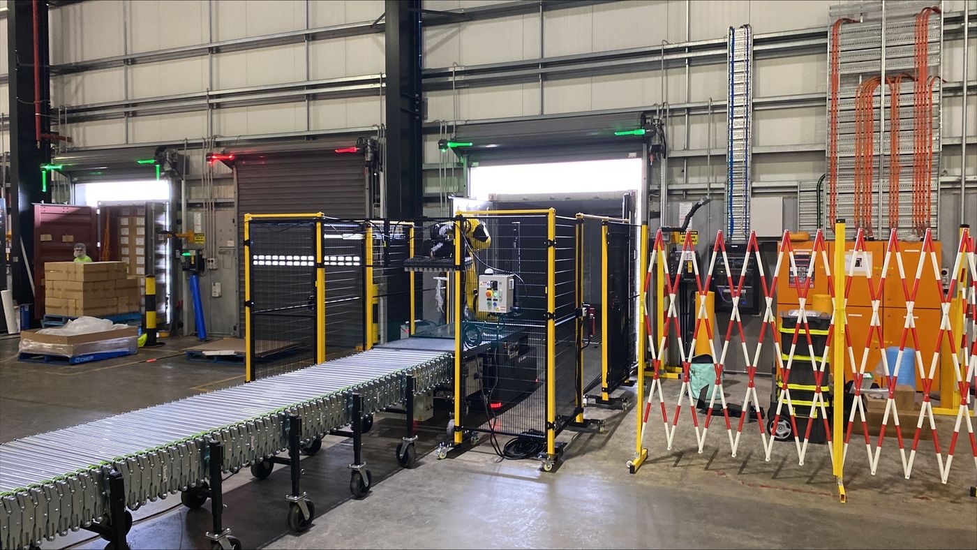 Rocky, 3PC's technology-assisted unloading system, operating alongside a 3PC crew on a live site